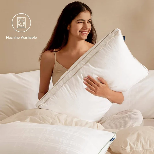 Pillows arranged on a neutral bedroom setting
